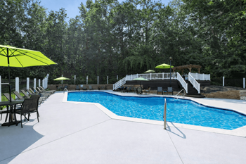 The greens at hollymead poolside lounge & grilling area